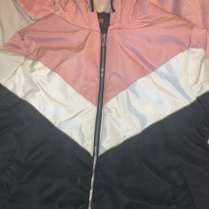 Coat , size large . Colors pink , white , black and cream
